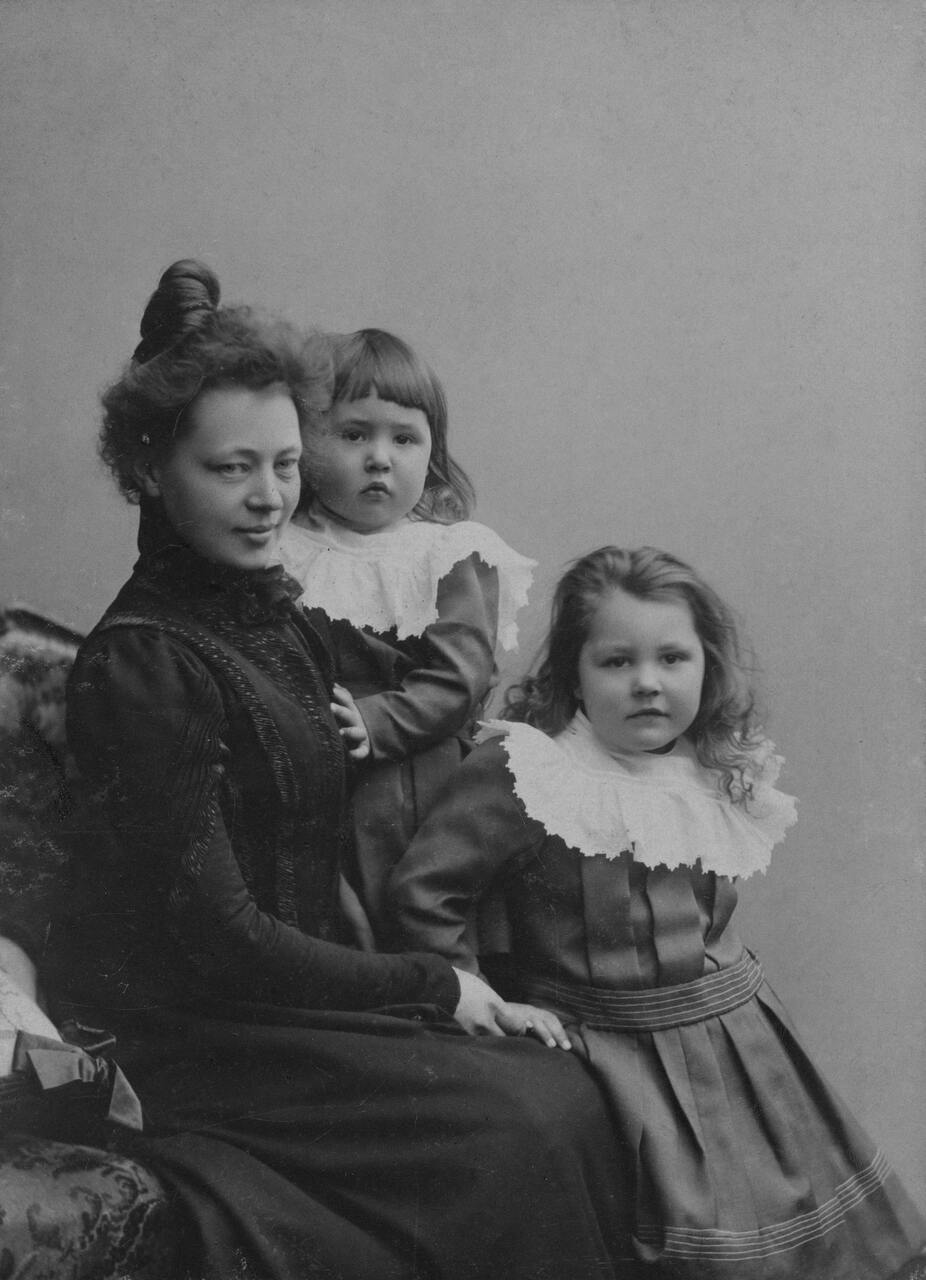 old photo of family portrait with mom and kids image