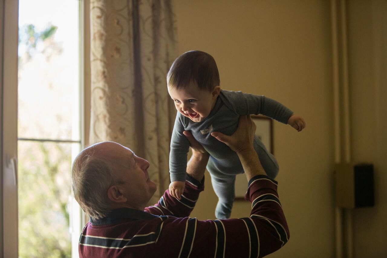 grandfather with baby image
